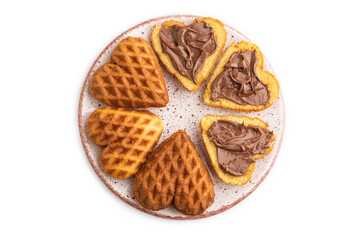 Homemade waffle with chocolate butter isolated on white. top view, flat lay.