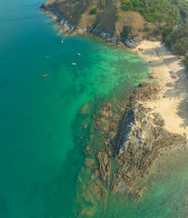 .aerial panorama view above turquoise sea around Nui beach small beach surrounded by tourist attractions..Nui beach is the good place for swimming snorkeling and sea canoe..turquoise sea background..