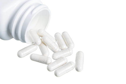 White therapeutic capsules, vitamin pills or drugs for treatment isolated on transparent background, medicine and healthcare concept, close-up view