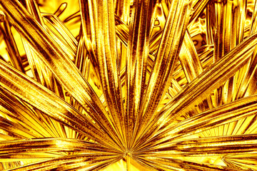 Golden palm tree leaves background, gold flower leaf texture, yellow metal tropical foliage backdrop, metallic floral branch pattern, abstract plant ornament, art wallpaper design, vintage decoration