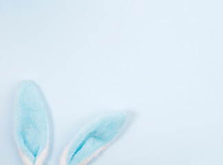 Blue rabbit ears on a blue background.