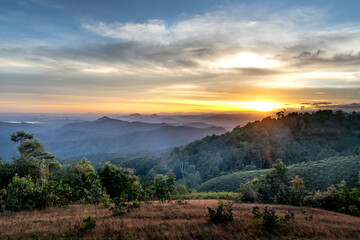 Fanciful scenery of an early morning when the sun rises over the Dai Lao mountain range, Bao Loc...