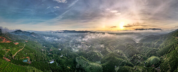 Fanciful scenery of an early morning when the sun rises over the Dai Lao mountain range, Bao Loc...