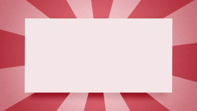 Grainy frame with copy space on red turning starburst background. 4k looping animation