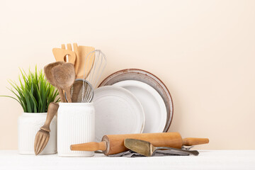 Kitchen utensils on wooden table