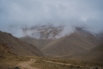 rolling hills and clouds on the top of the mountain at Ladakh, Leh, India