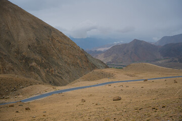 Beautiful view of Khardung La Pass- Leh road on the high mountain covered with snow. It is the highest pass in the world that motorbikes can run through at Ladakh, Leh, India