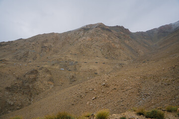 rolling hills and clouds on the top of the mountain at Ladakh, Leh, India
