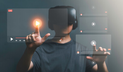 Business man making video of business 4.0. Man using VR Headset and hand for streaming online on virtual screen, watching video on internet, live concert, show or tutorial, content online internet.