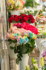 Selling colorful roses in a floral store in the spring, summer time
