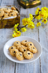 butter cookies or kue semprit on the wooden table