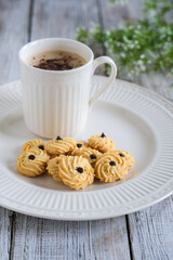 butter cookies or kue semprit on the wooden table