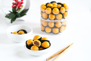 nastar cookies, pineapple tarts or nanas tart filled with pineapple jam, commonly found when hari...