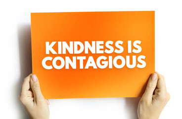 Kindness Is Contagious text on card, concept background