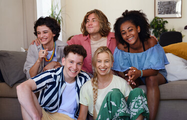 Portrait of diverse group of friends with mixed races having fun together indoors, Friendship and lifestyle concepts