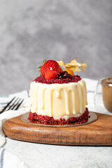 Fruit cream cake. Bakery desserts. Delicious round portion cake with strawberries and cream