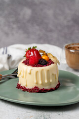 Fruit cream cake. Bakery desserts. Delicious round portion cake with strawberries and cream