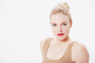 Confidence comes with looking great. Portrait of a stern model with red lipstick on.