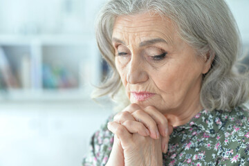 Close up portrait of sad senior woman