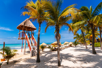 Tropical paradise beach with white sand and coco palms travel tourism wide panorama background. Luxury vacation and holiday, tropical beach resort concept. Beautiful beach design