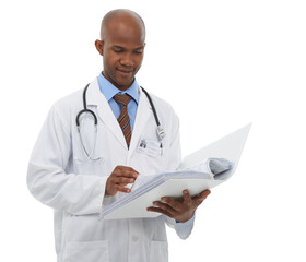Looking through your medical records. A young african doctor looking through a patients medical records.