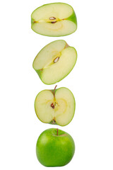 Falling green apple slice isolated on white background.