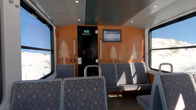 First Person POV, Riding the Train to Gornergrat on Beautiful Clear Day in Winter. Slow Motion