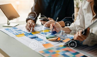  UX developer and ui designer brainstorming about mobile app interface wireframe design with...