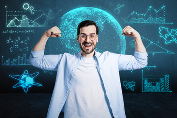 Happy young european businessman celebrating success with glowing mathematical formulas and globe hologram on blurry blue background. Equation, digital data and mathematics app concept.