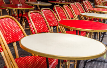 Typical table and chairs in the streets of Paris, France