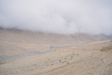 Clouds fly over the top of the mountain, beautiful scenery at Ladakh, India