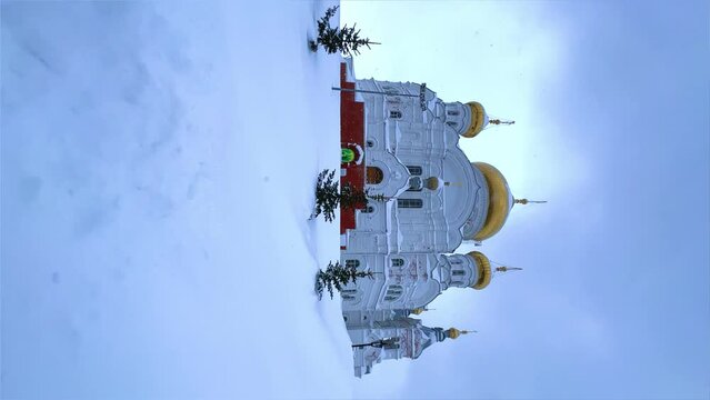 Belogorsky St. Nicholas Orthodox Missionary Monastery. Russia, Perm Krai, Belaya Gora. The temple on the hill in winter. Monastery on the background of snow.