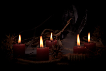 Voodoo Doll on a wooden background with dramatic lighting.