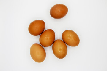 Raw egg on a white background