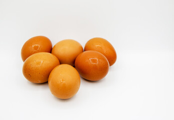 Raw egg on a white background