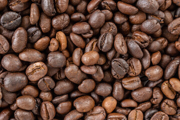 Fresh roasted brown coffee beans background