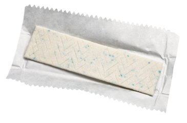 Chewing gum plate on wrapping paper isolated on transparent background