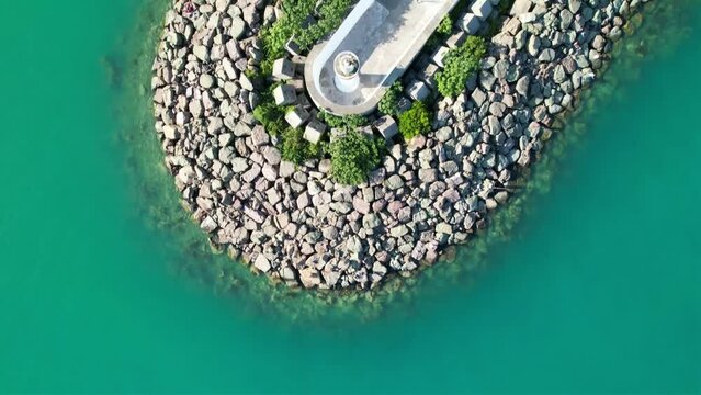 aerial view of the sea and the coast. Aerial view of Gerze harbor on a sunny summer day. Lighthouses and small harbors. Black Sea coast. Aerial shot of a small seaside town.