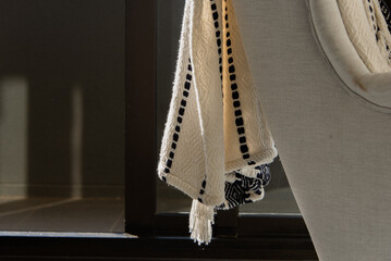 Obraz premium close up of throw rug hanging off the end of a sofa