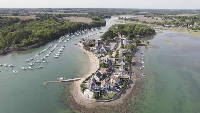Vacation homes in Conleau Island Vannes, Northern France with sailboats and beaches, Aerial orbit shot