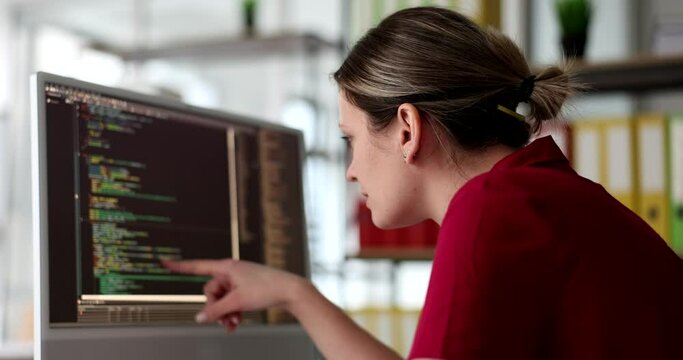 Development of programming and coding technologies woman programmer at computer