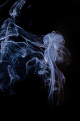 Smoke motion on black background.