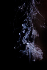 Smoke motion on black background.