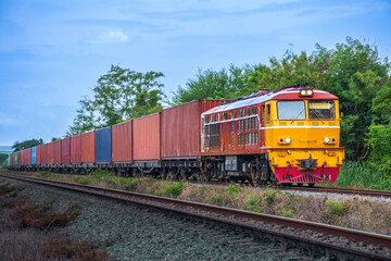 Plakat Container-freight train by diesel locomotive on the railway.