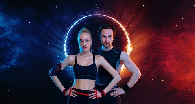 Download photo for advertising a fitness club in social networks. Fitness Influencers. Fitness couple at home. Cover for sport motivation music. Fit man and woman at the gym on black background.
