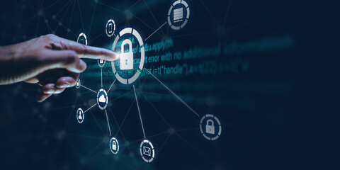 Business, technology, internet and networking concept. Young businessman working in the office, select the icon security on the virtual display.