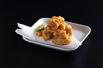 Chicken Karaage Japanese Fried chicken isolated in black background