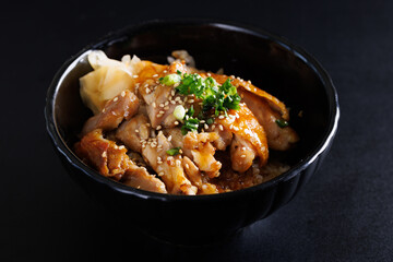 Grilled Chicken teriyaki rice Japanese food isolated in black background