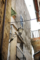 Narrow old streets of the famous Pitigliano town. Beautiful italian towns and villages. Etruscan heritage, Grosseto, Tuscany, Italy.