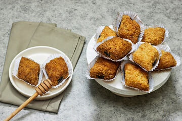 Fried Makrout or makroud - Algerian semolina, dates and honey sweets, traditional North Africa sweet food for islam